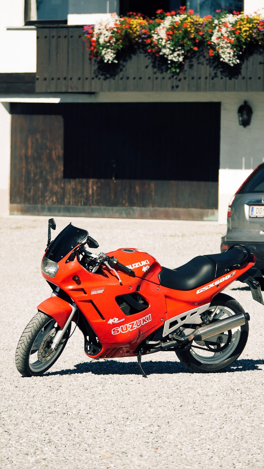 orange and black sports bike