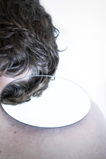 person with brown and black hair