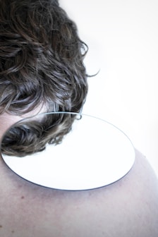 person with brown and black hair