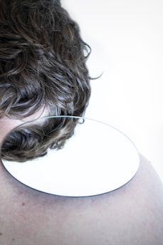 person with brown and black hair