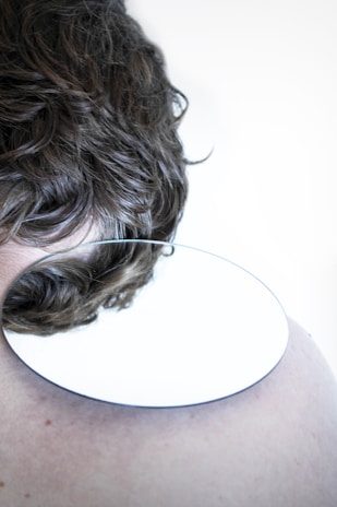 person with brown and black hair