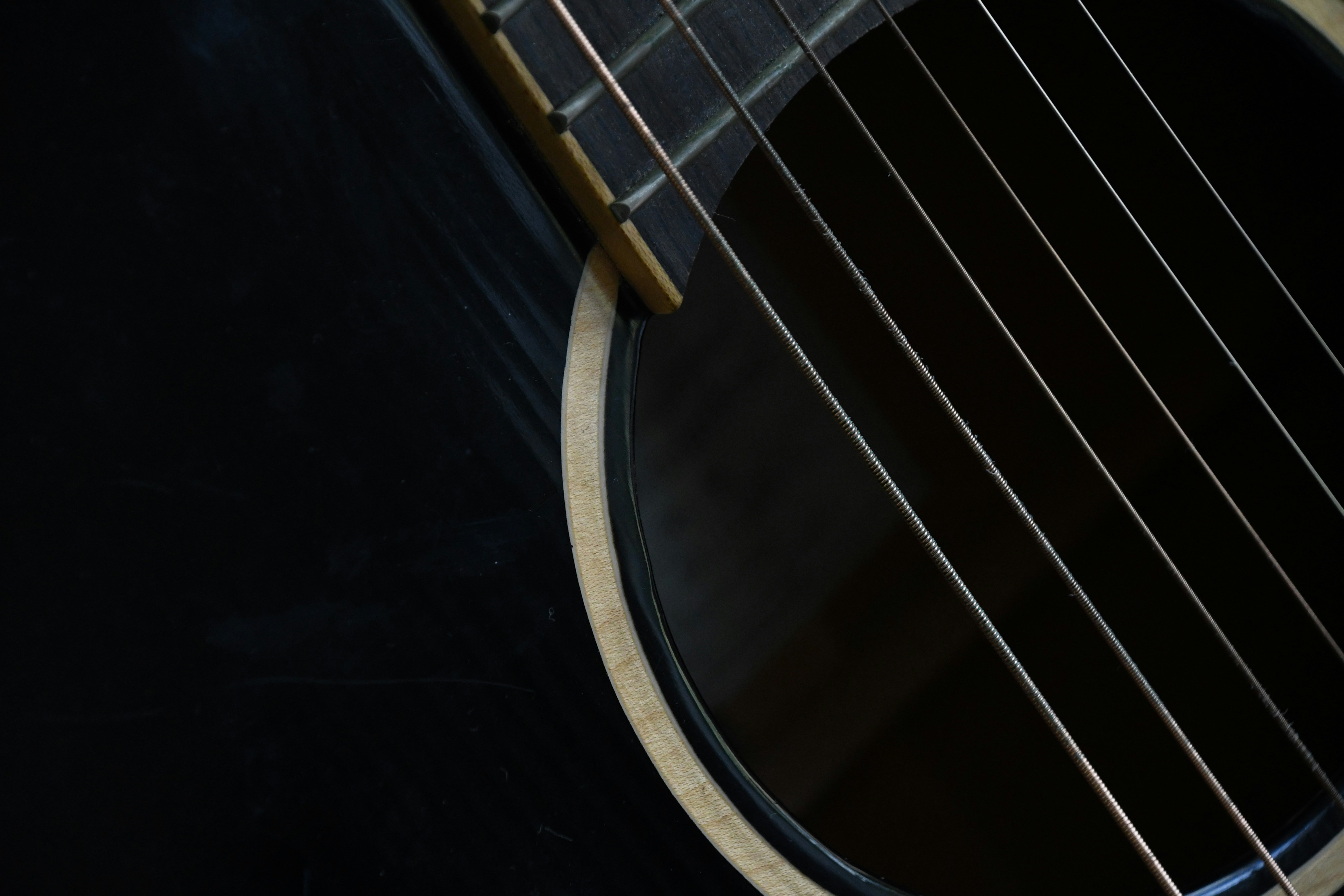 black and brown acoustic guitar