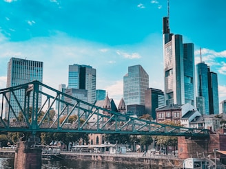 gray concrete bridge over river during daytime