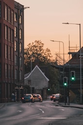 cars on road near building during daytime
