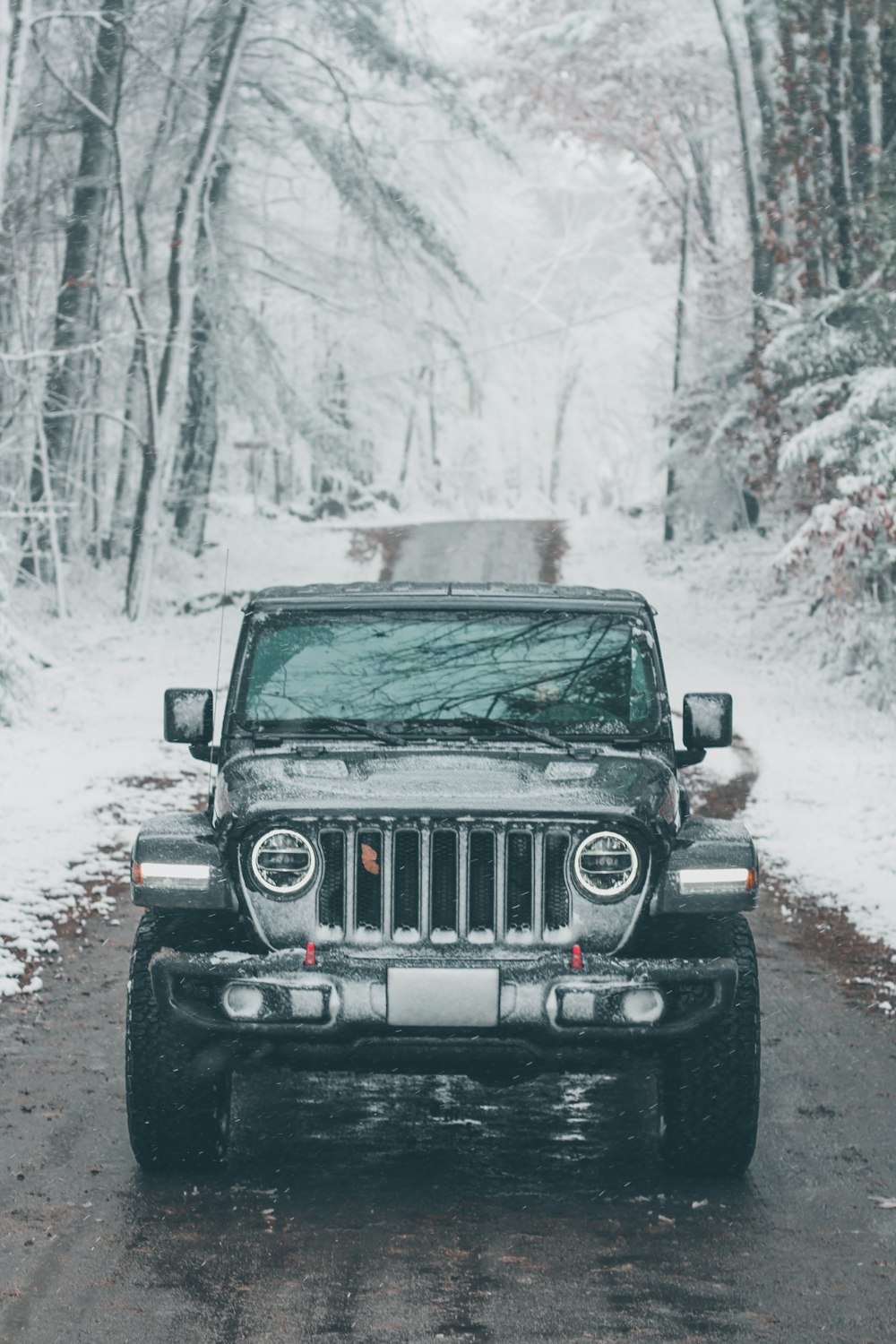 black jeep wrangler on snow covered road during daytime photo – Free Grey  Image on Unsplash