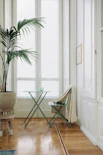 white wooden chair near white wooden door