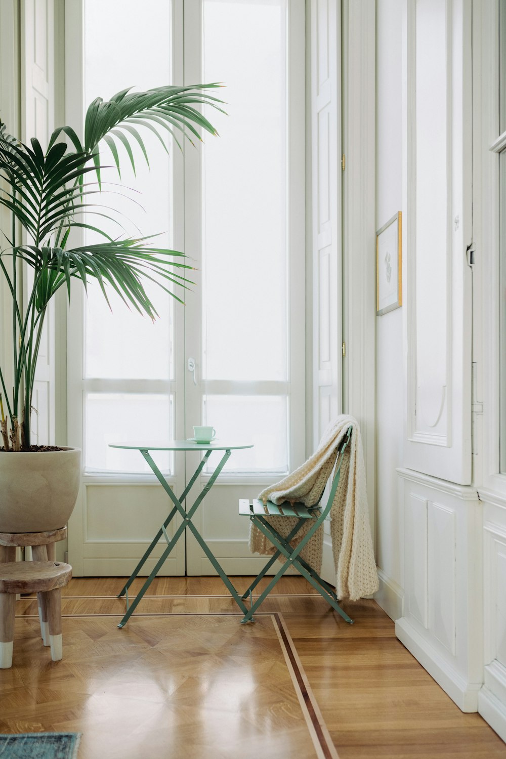 white wooden chair near white wooden door