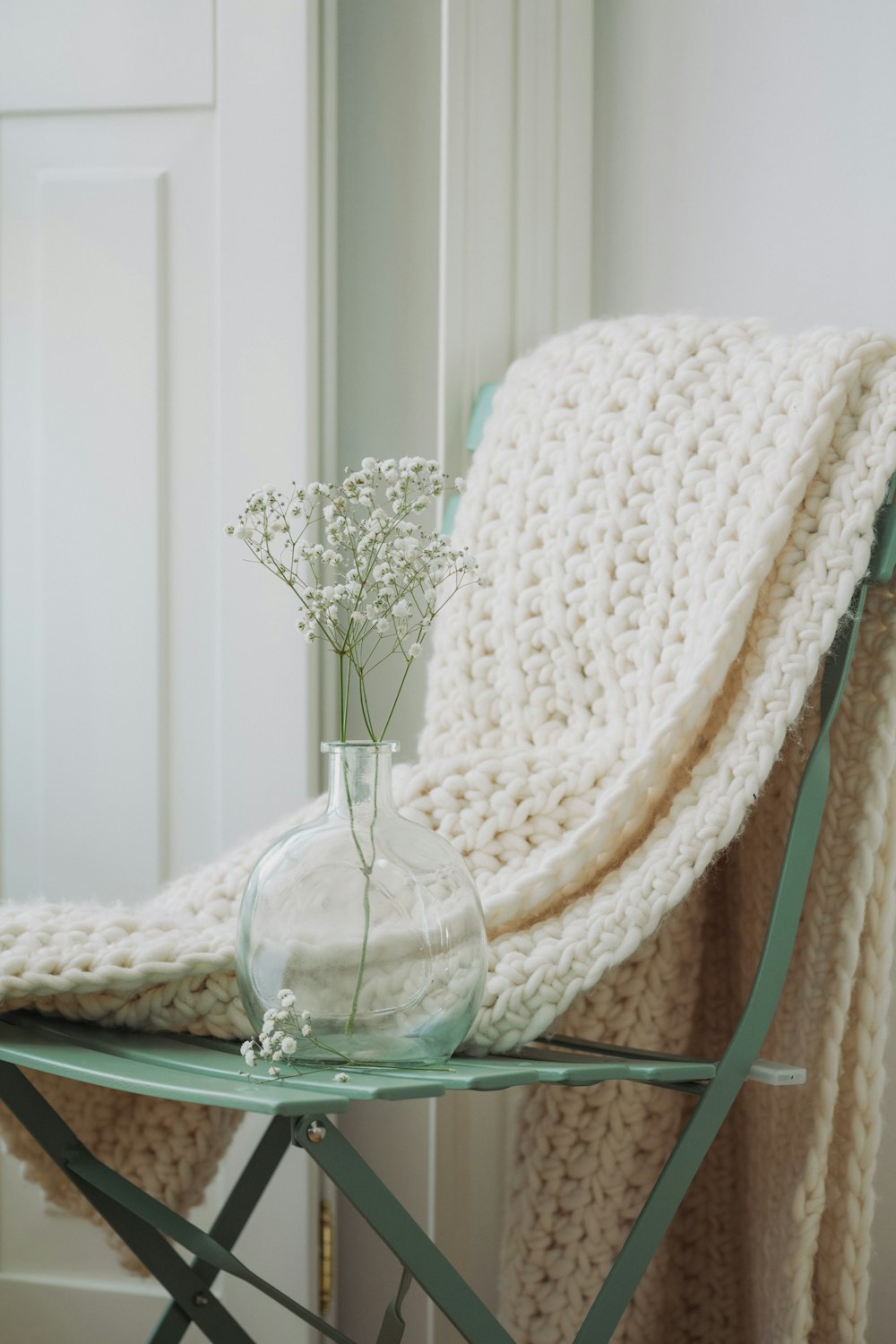 white and brown wicker chair