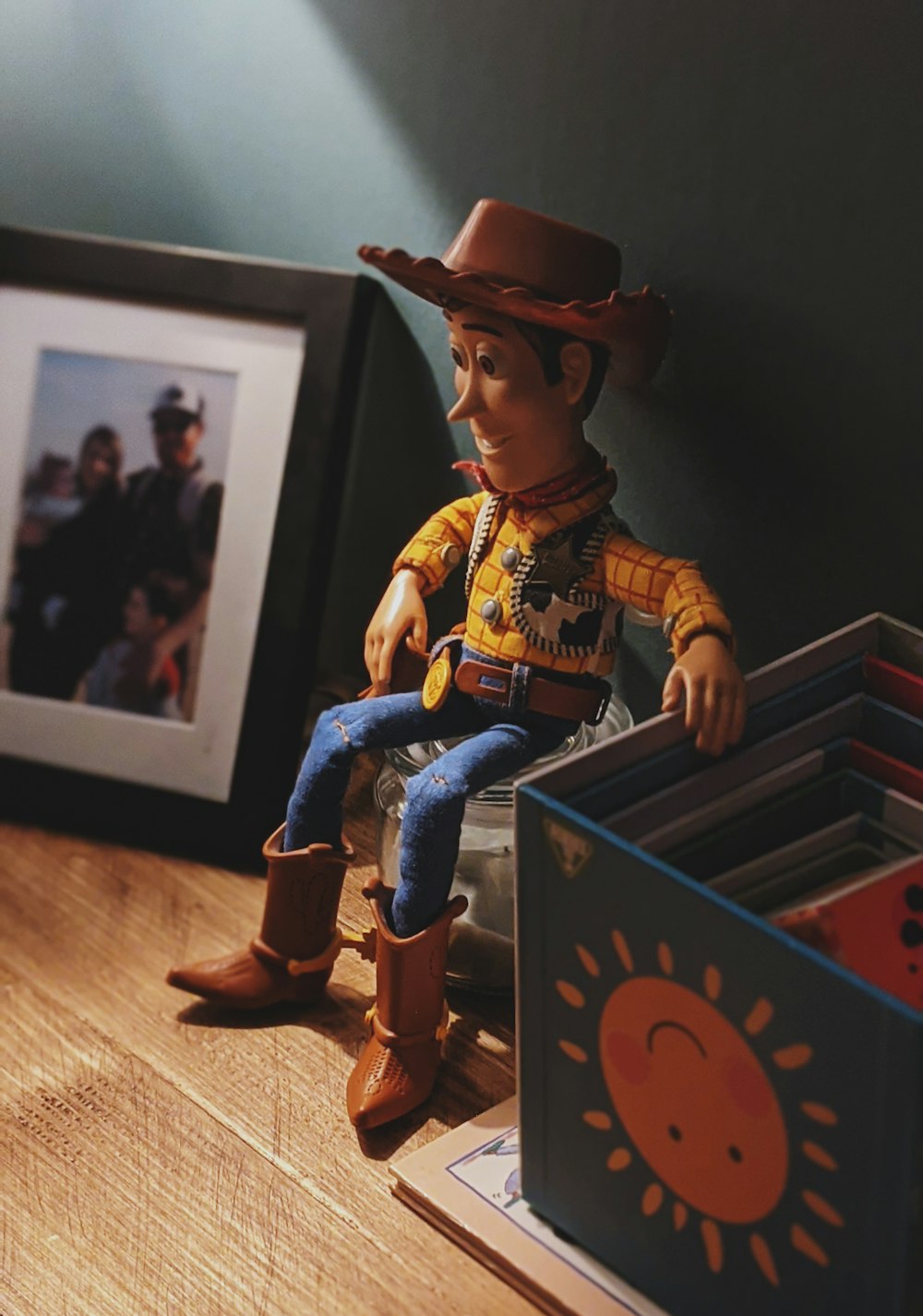 boy in cowboy costume standing on wooden box