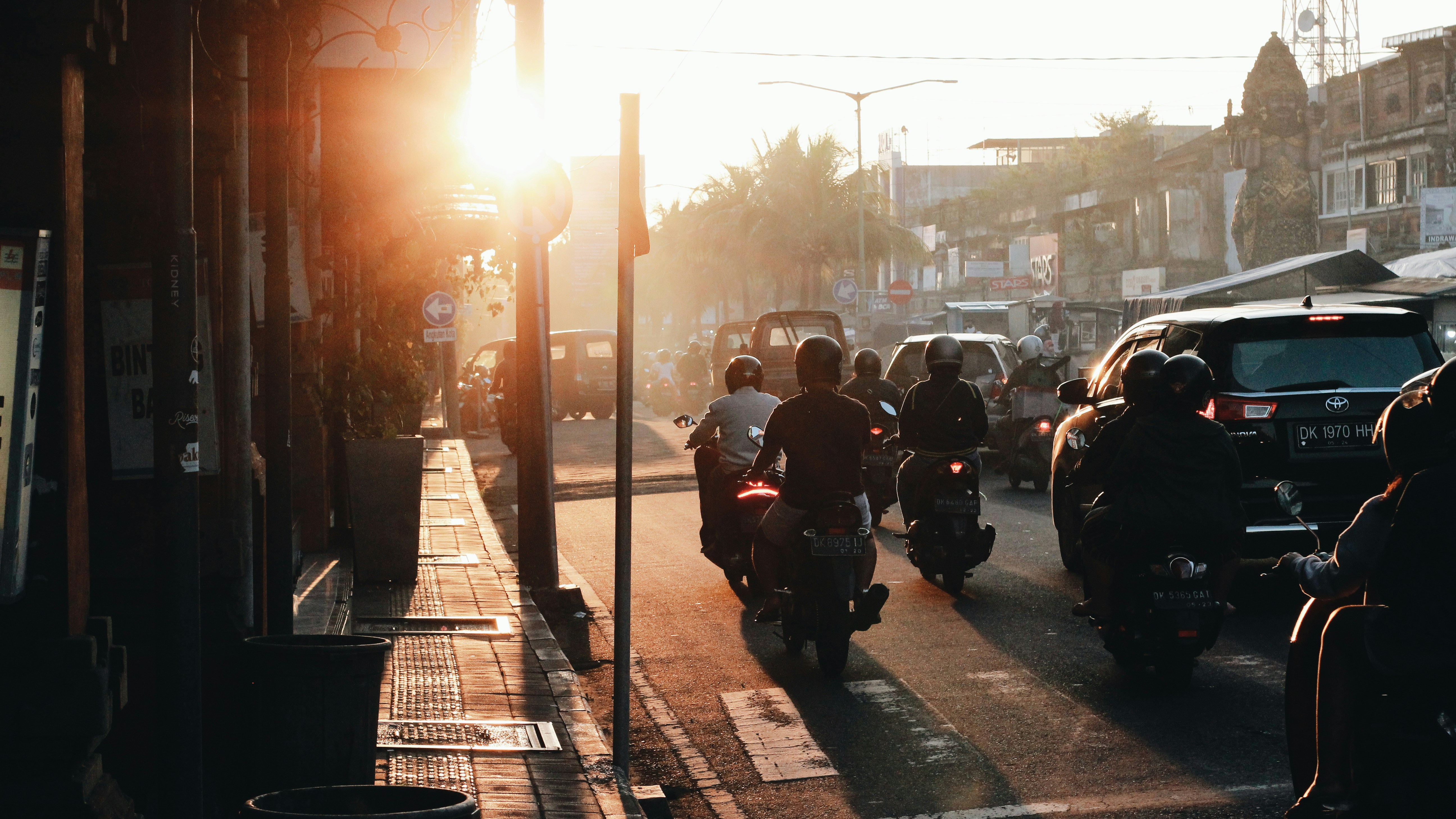 People riding motorcycles on road during daytime - representing travel adventures