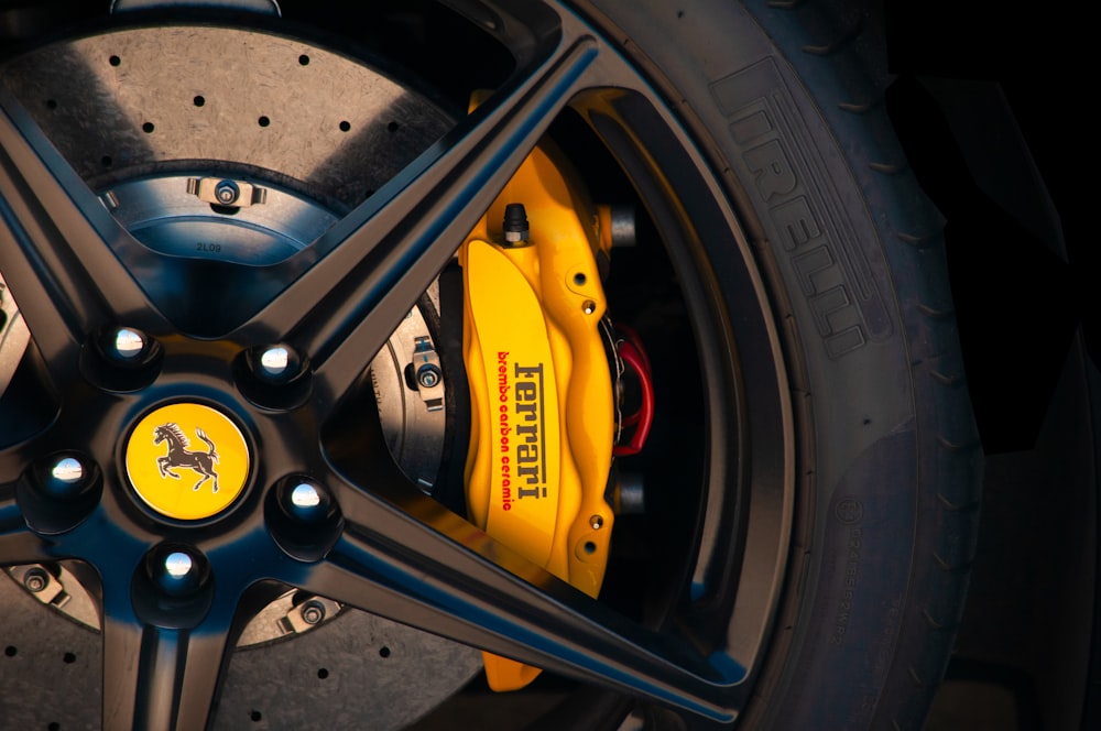 black and yellow car wheel