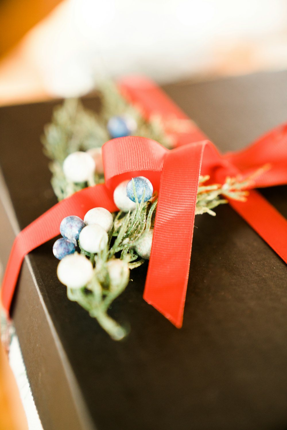 white and green flower bouquet on brown wooden table