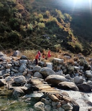 Group of diverse pilgrims walking joyfully along a scenic path on the Camino de Santiago.