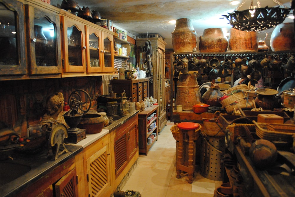 brown wooden cabinet with assorted items