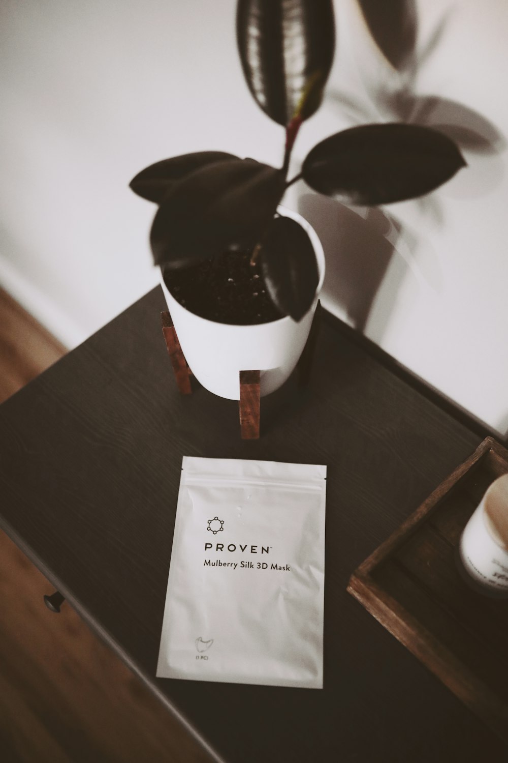 white paper bag on brown wooden table