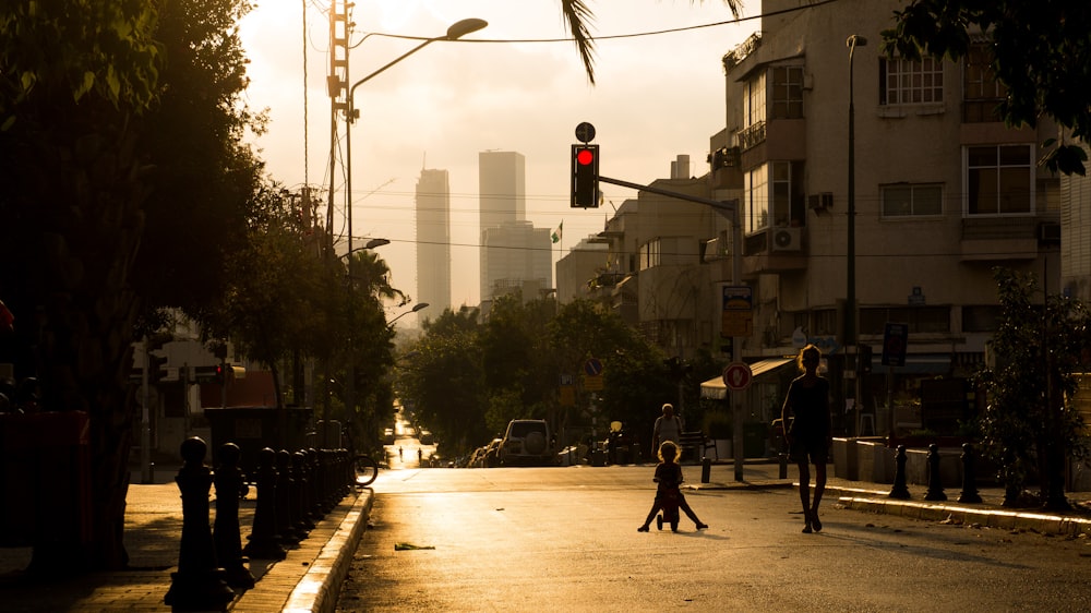 people walking on sidewalk during daytime