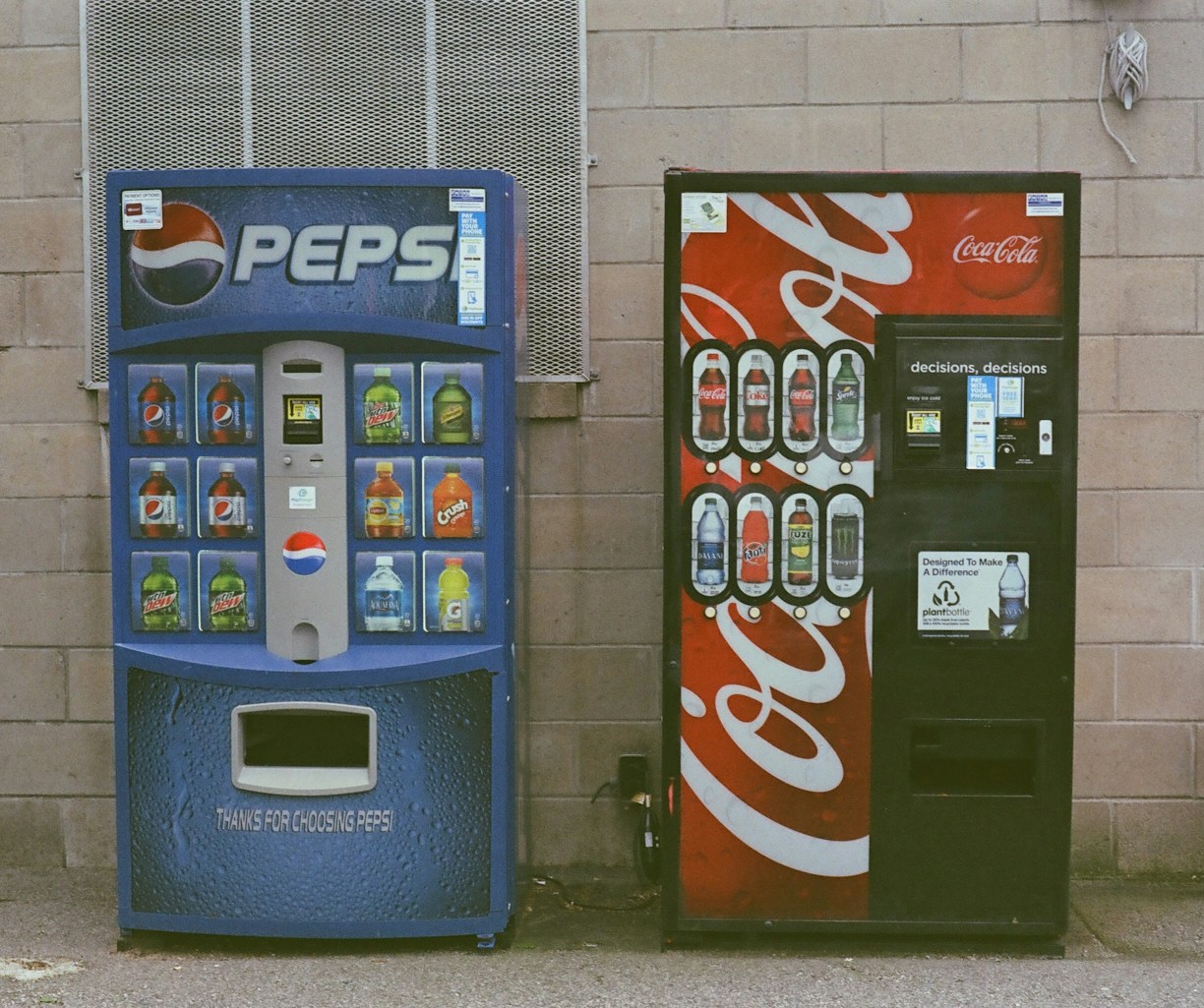 blue and white pepsi cola vending machine