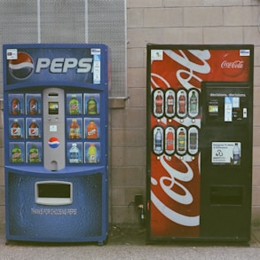 blue and white pepsi cola vending machine