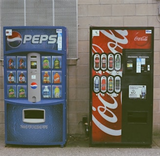 blue and white pepsi cola vending machine