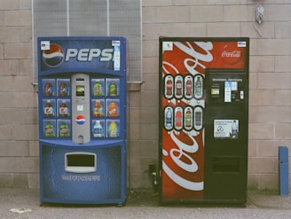 blue and white pepsi cola vending machine