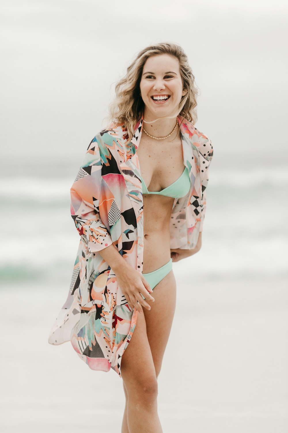 woman in white and brown floral bikini set