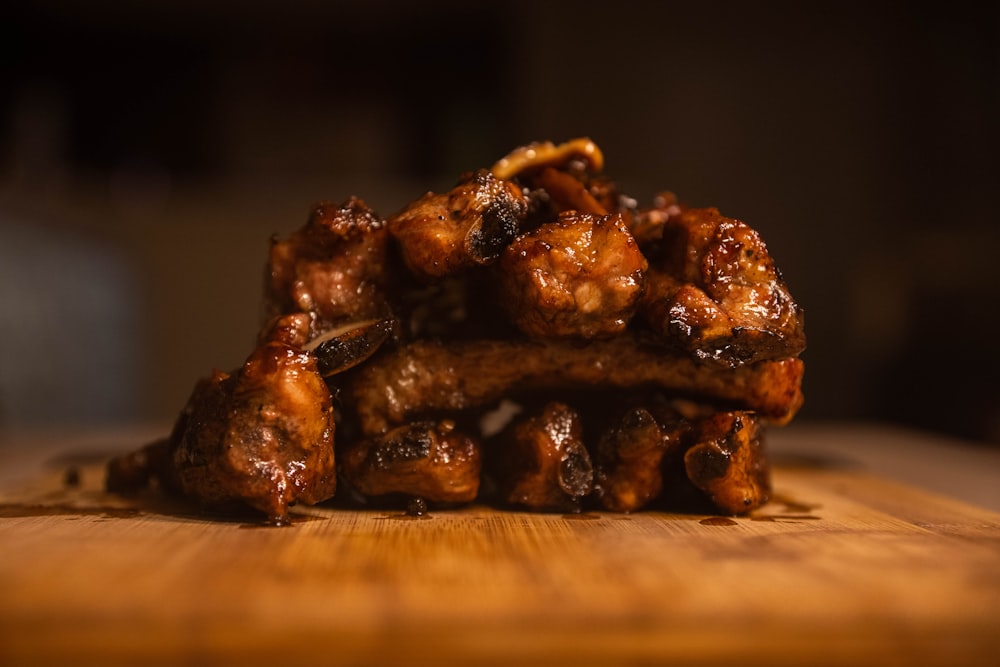 brown fried chicken on brown wooden chopping board