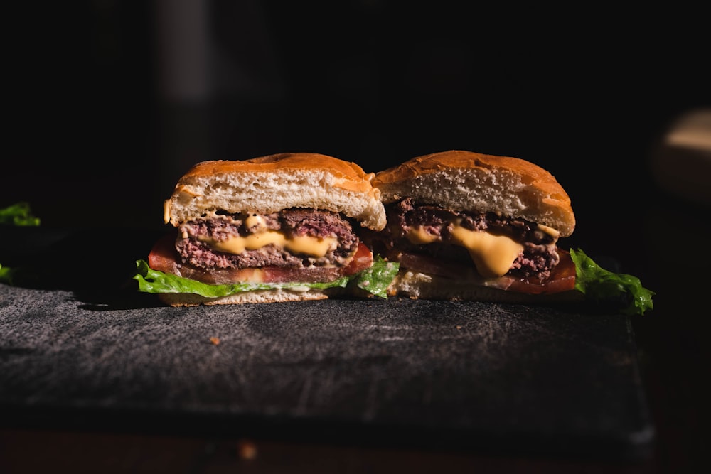 burger on black wooden table