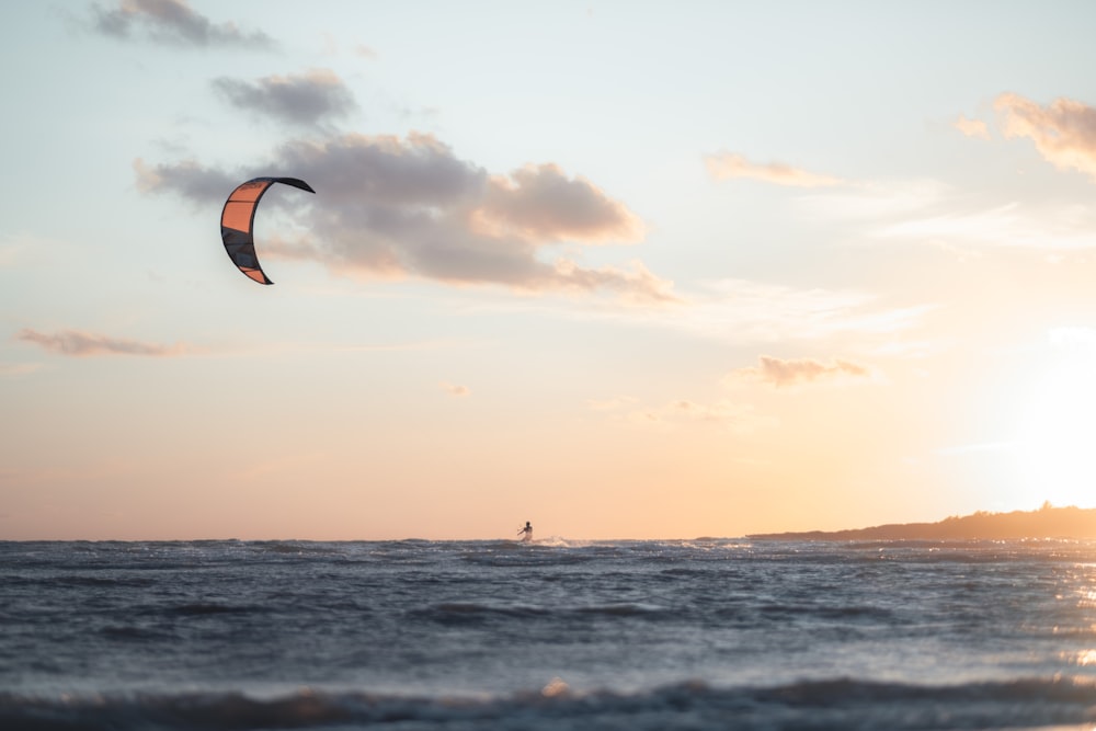 person surfing on sea during daytime