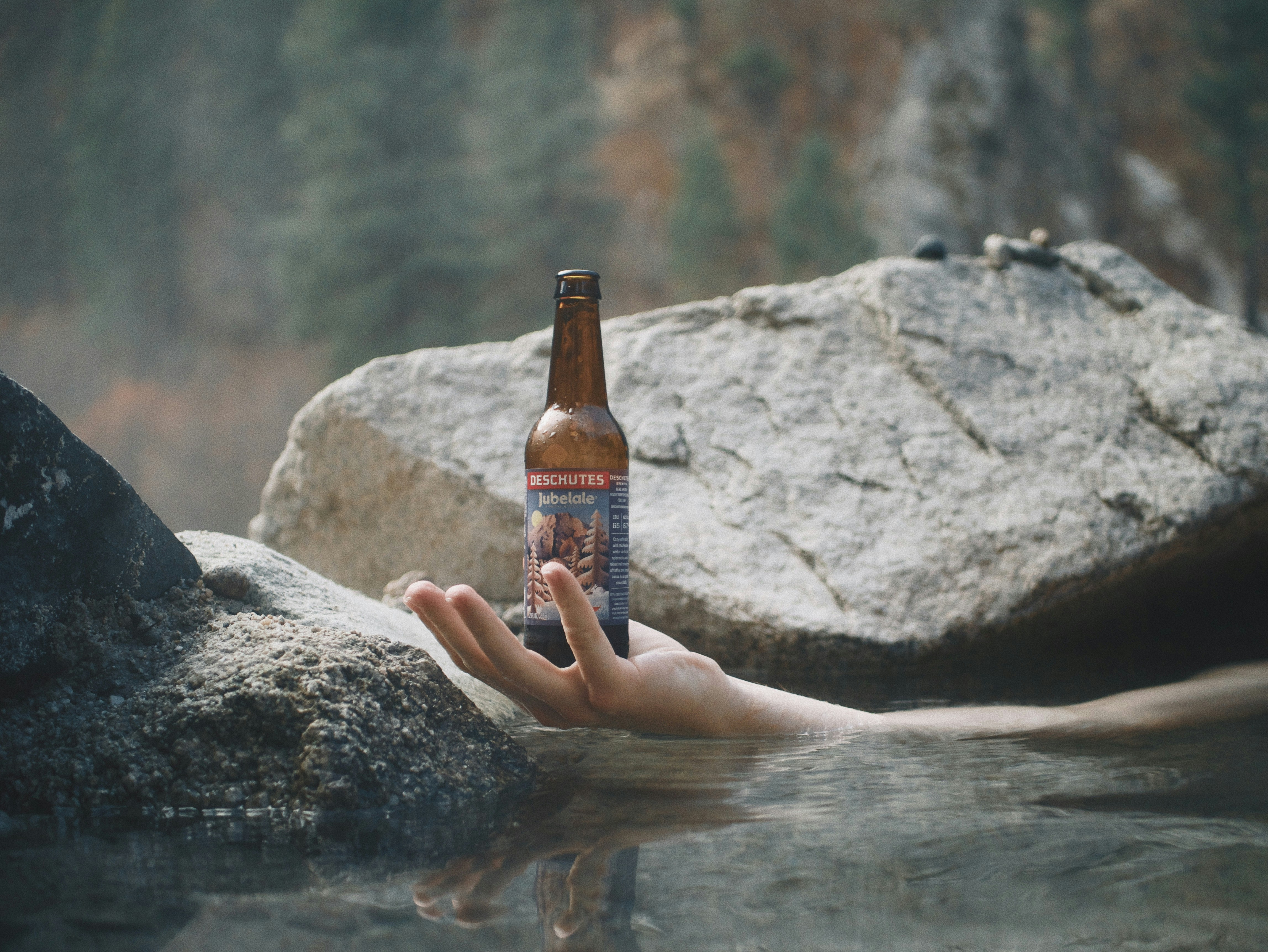 brown glass bottle on gray rock, Pine Flats Hot Springs