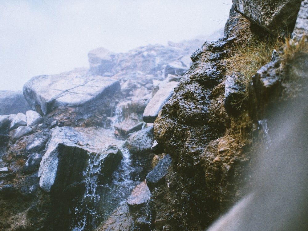 water falls on rocky mountain