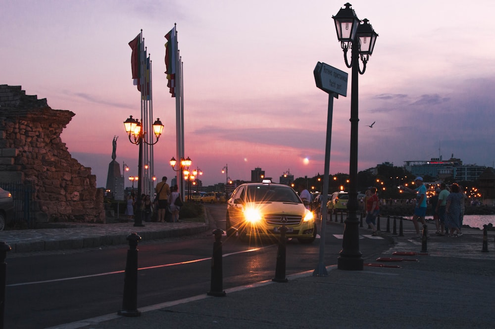cars on road during sunset