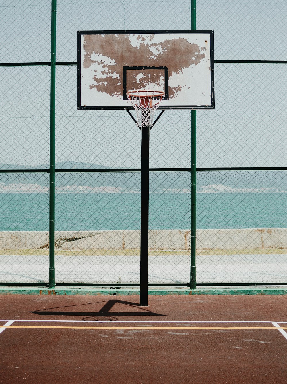 basketball hoop with no smoking sign