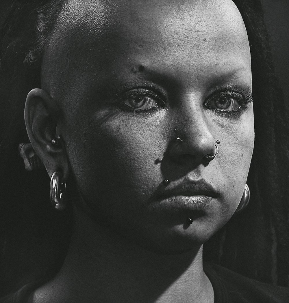 grayscale photo of womans face