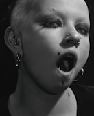 A close-up of a beautifully done piercing on a model.