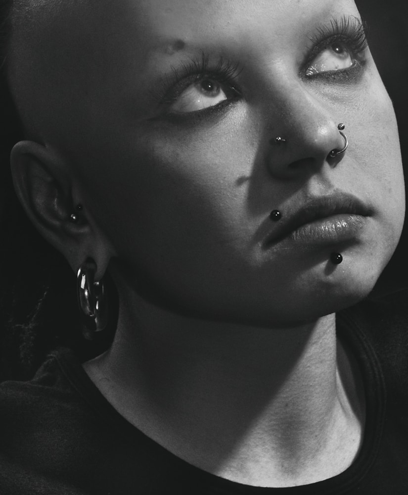Person with a nose ring in natural light