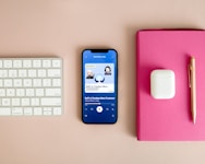 blue iphone 5 c beside white apple charger