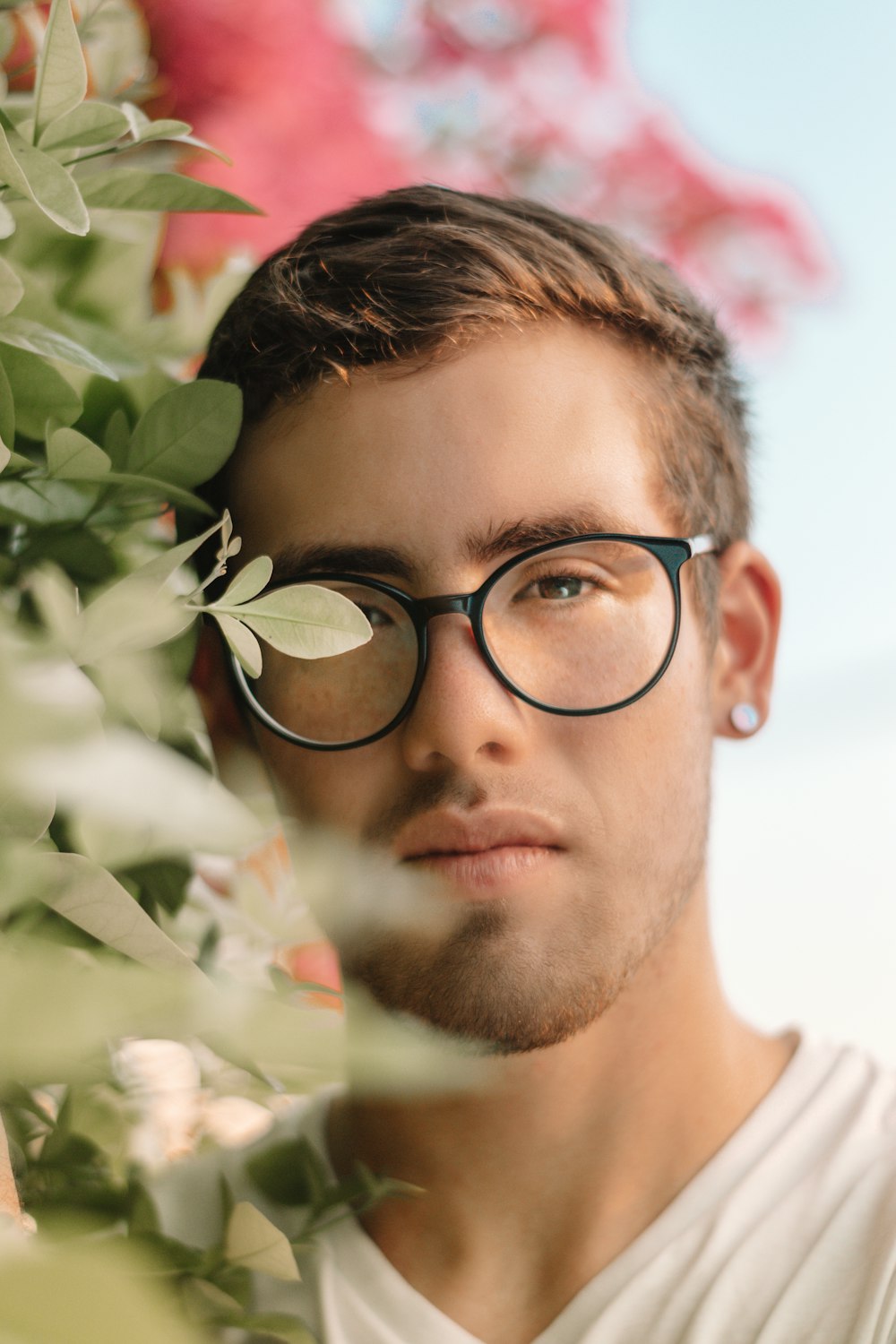 man wearing black framed eyeglasses