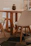 A beautifully crafted wooden dining table set in a modern home.