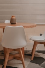 white and brown wooden chair