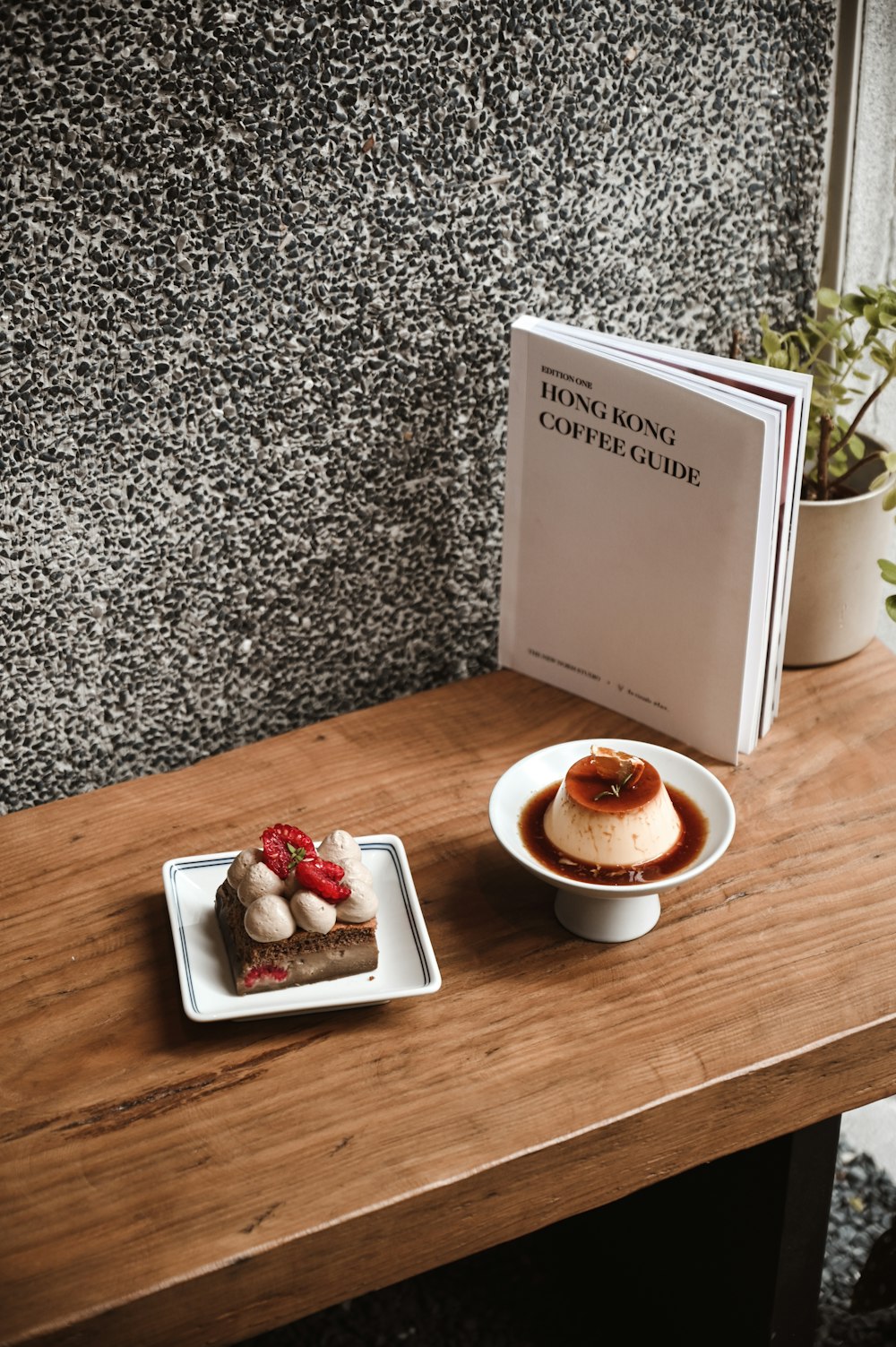 white ceramic mug on brown wooden table