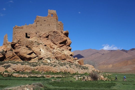 brown rock formation under blue sky during daytime