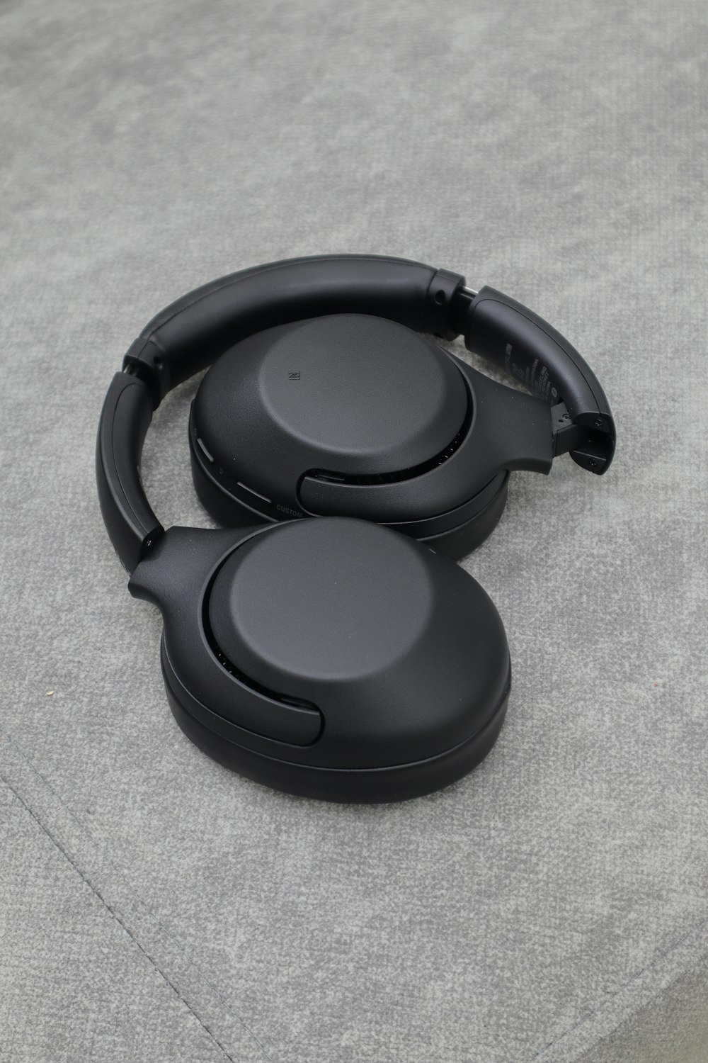 black and gray wireless headphones