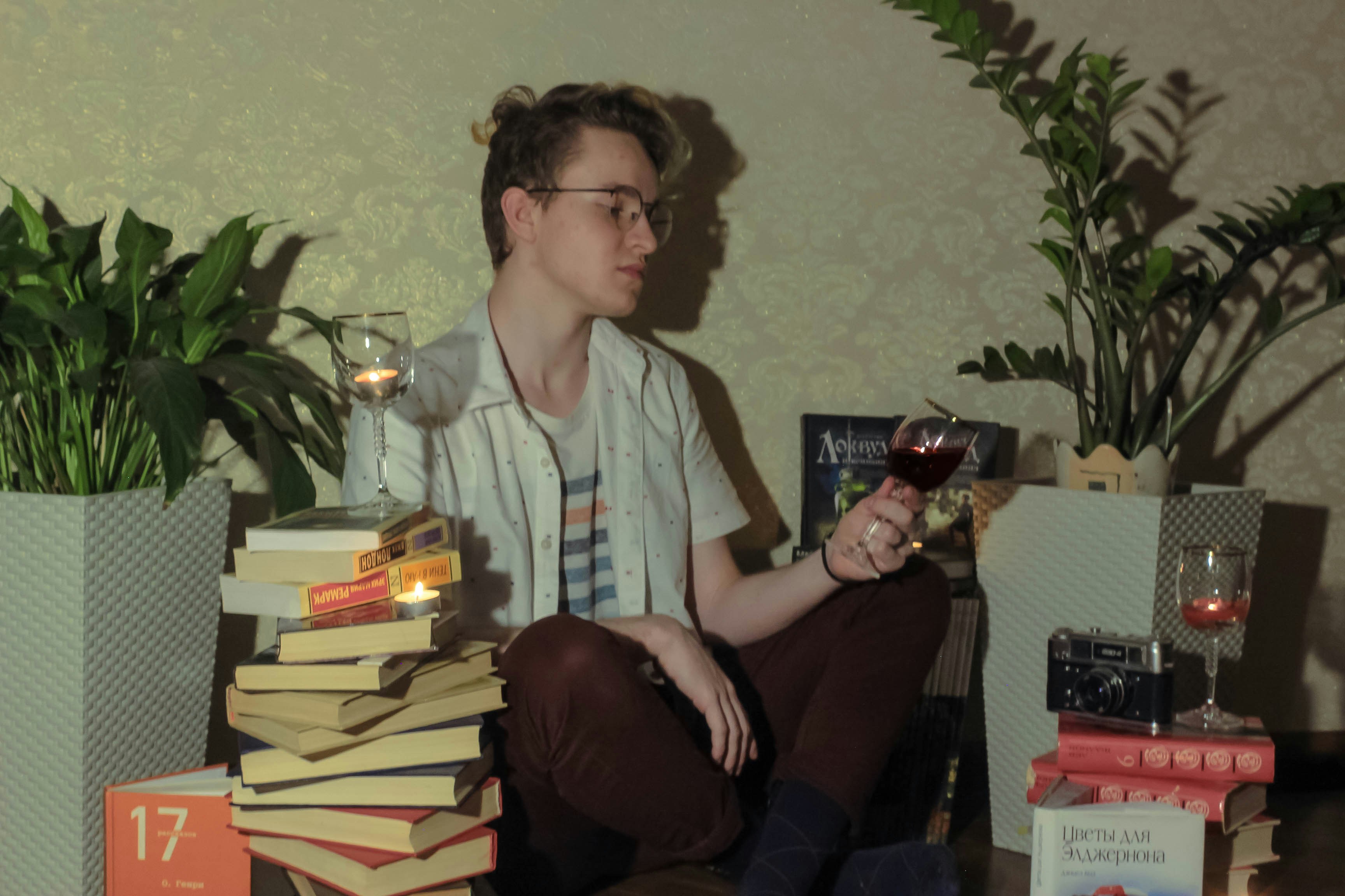 woman in black framed eyeglasses sitting beside man in blue button up shirt