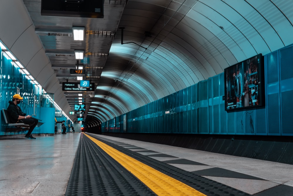 green and yellow tunnel with yellow and black line