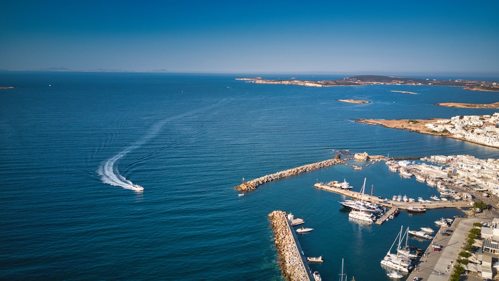 white ship on blue sea during daytime