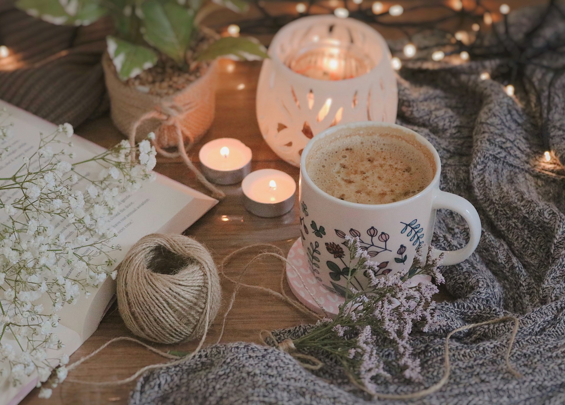white ceramic mug on brown wooden table