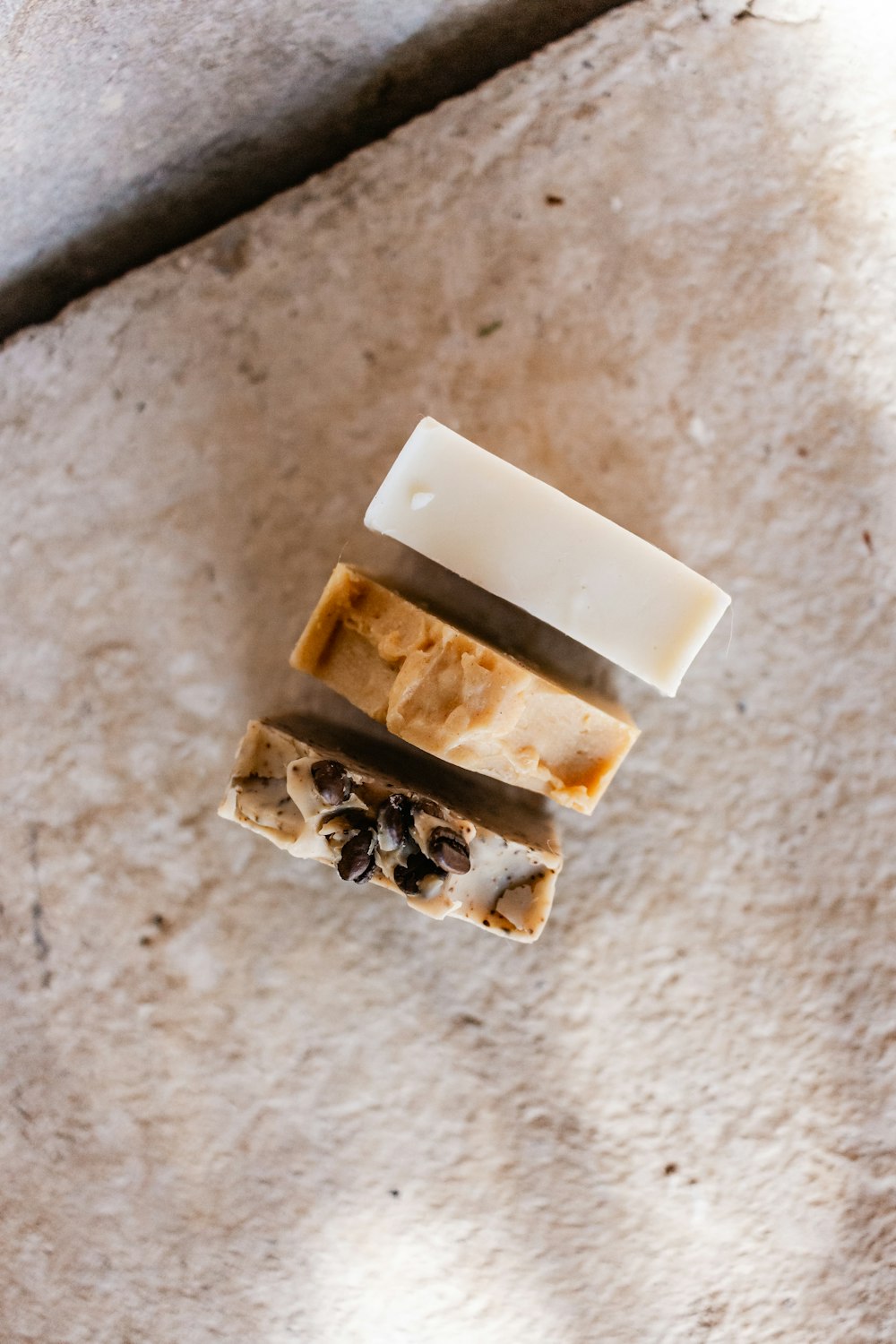 white square box on brown marble table