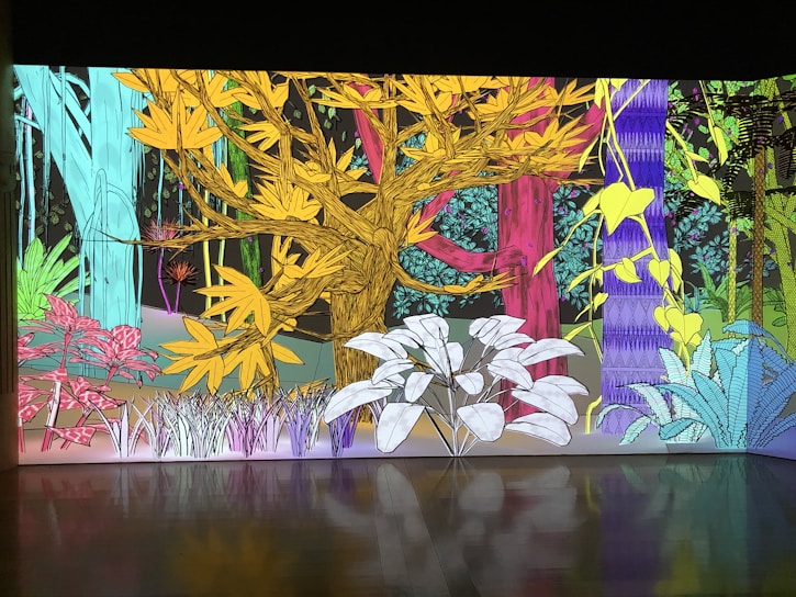 A colorful spread from a custom children's book featuring a whimsical forest scene with playful animals.