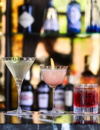 five beautiful cocktails with different garnishes