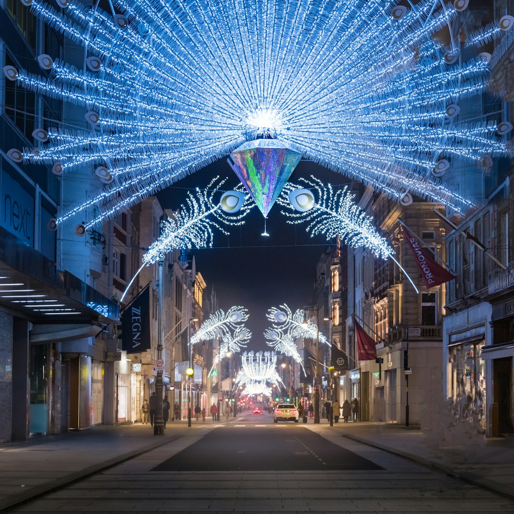 Blue and white string lights illuminating a London street